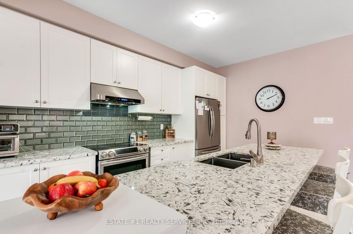 Photo 9 at 13 Andretti Crescent, Credit Valley, Brampton