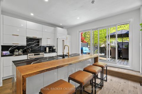 Photo 18 at 143 Parkmount Road, Coxwell, Toronto
