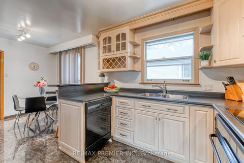 Photo 12 at 217 La Rose Avenue, Richview, Toronto