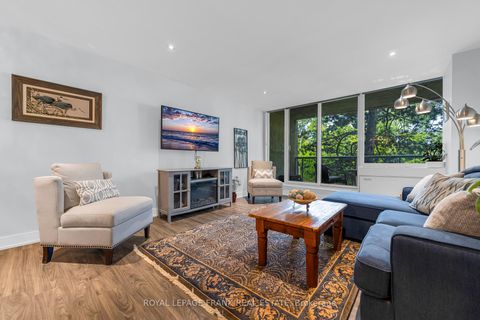 Photo 3 at 105 - 20 SPEERS Road, CO Central, Oakville