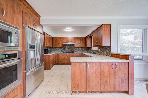 Photo 10 at 63 Purcell Square, Steeles, Toronto