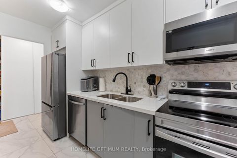 Photo 1 at 1076 - 100 Mornelle Court, Morningside, Toronto