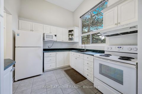Photo 8 at 129 Jenny Wren Way, Hillcrest Village, Toronto