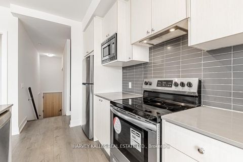 Photo 10 at 4 - 60 George Butchart Drive, CFB, Toronto