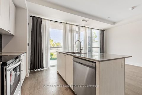 Photo 12 at 4 - 60 George Butchart Drive, CFB, Toronto