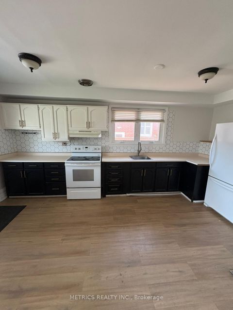 Photo 3 at 100 Snowood Court, Jane Heights, Toronto