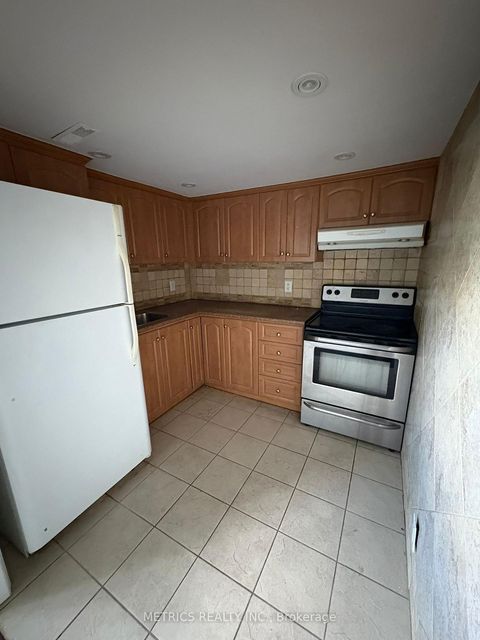 Photo 9 at 100 Snowood Court, Jane Heights, Toronto