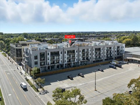 Photo 1 at 409 - 123 Maurice Drive, CO Central, Oakville