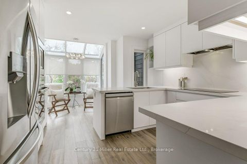 Photo 12 at 17 - 1120 Queens Avenue, CP College Park, Oakville