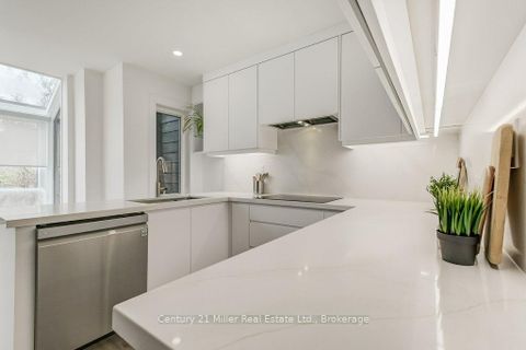 Photo 13 at 17 - 1120 Queens Avenue, CP College Park, Oakville