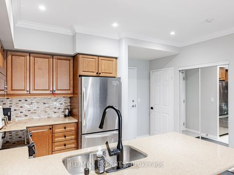 Photo 8 at 310 - 9451 Jane Street, Maple, Vaughan