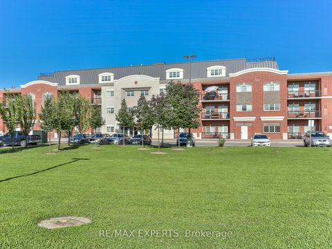 Photo 23 at 310 - 9451 Jane Street, Maple, Vaughan