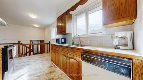 Photo 12 at 15 Thistlewaite Crescent, Malvern West, Toronto