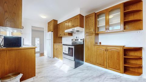 Photo 13 at 15 Thistlewaite Crescent, Malvern West, Toronto
