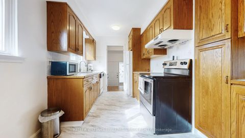 Photo 14 at 15 Thistlewaite Crescent, Malvern West, Toronto