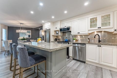 Photo 2 at A22 - 284 Mill Road, Markland Wood, Toronto