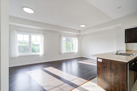 Photo 3 at 8 - 9 Eaton Park Lane, L'Amoreaux, Toronto