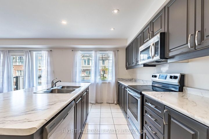 Photo 21 at 98 - 1000 Asleton Boulevard, WI Willmott, Milton