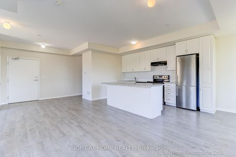 Photo 5 at 28 - 200 Alex Gardner Circle, Aurora Village, Aurora