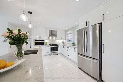 Photo 10 at 1 Hillavon Drive, Rosethorn, Toronto