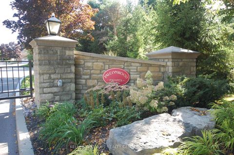 Photo 1 at 16 - 470 Falconwood Hollow W, Aurora Estates, Aurora