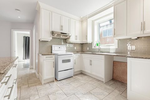 Photo 4 at 19 Stock Avenue, City Centre West, Toronto