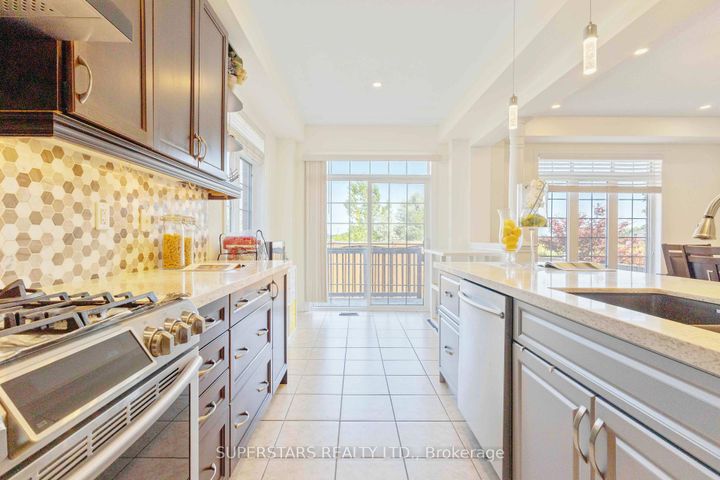 Photo 8 at 70 Living Cres Crescent, Victoria Square, Markham