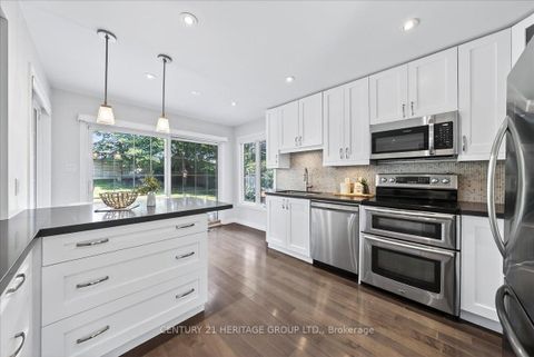 Photo 8 at 76 Attridge Drive, Aurora Village, Aurora