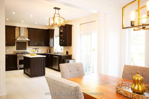Photo 4 at 128 Wolf Creek Crescent, Patterson, Vaughan