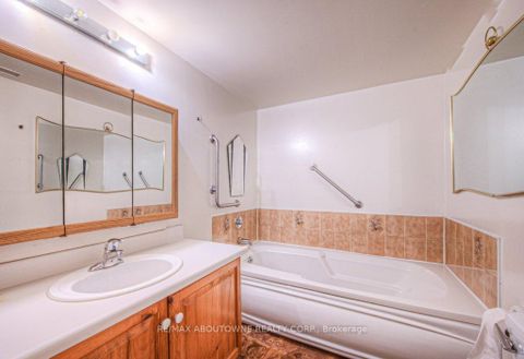 Photo 11 at 103 - 1071 Queens Avenue, CP College Park, Oakville