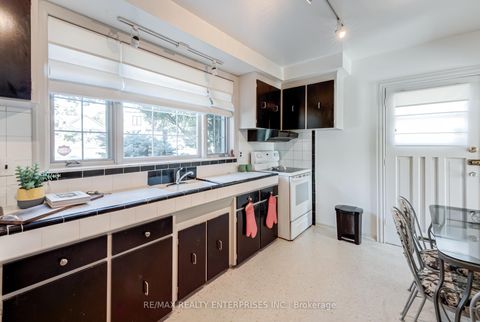 Photo 12 at 65 Black Creek Boulevard, Smythe, Toronto