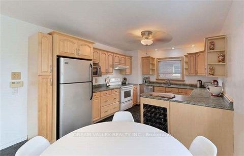 Photo 3 at 107 Commonwealth Avenue, Kennedy Park, Toronto