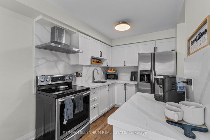 Photo 17 at 17 Prince Crescent, Northwest Sandalwood Parkway, Brampton