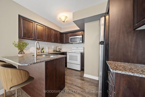 Photo 5 at 233 - 60 Fairfax Crescent, Birchmount, Toronto