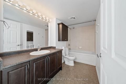Photo 9 at 233 - 60 Fairfax Crescent, Birchmount, Toronto