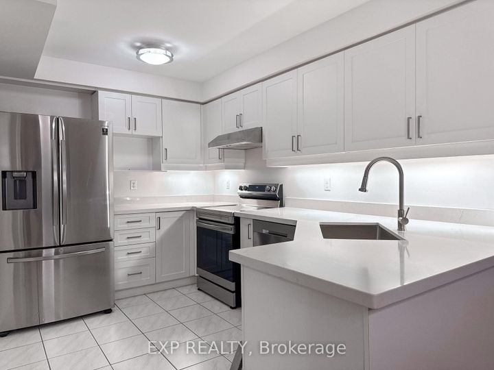 Photo 2 at 55 - 9900 McLaughlin Road N, Fletcher's Creek Village, Brampton