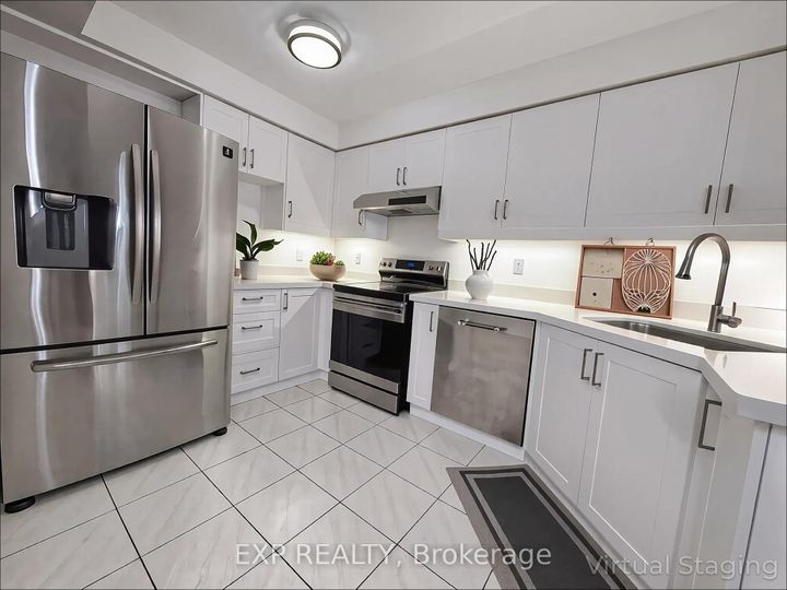 Photo 3 at 55 - 9900 McLaughlin Road N, Fletcher's Creek Village, Brampton