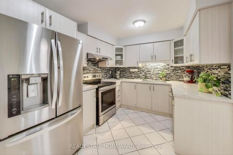 Photo 3 at 9 - 25 Whitecap Boulevard, Scarborough Village, Toronto