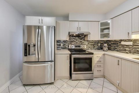 Photo 8 at 9 - 25 Whitecap Boulevard, Scarborough Village, Toronto