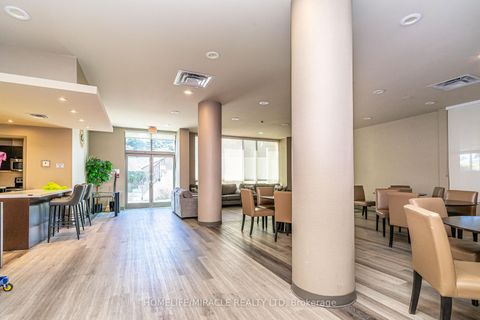 Photo 38 at 309 - 88 Grangeway Avenue, Woburn, Toronto