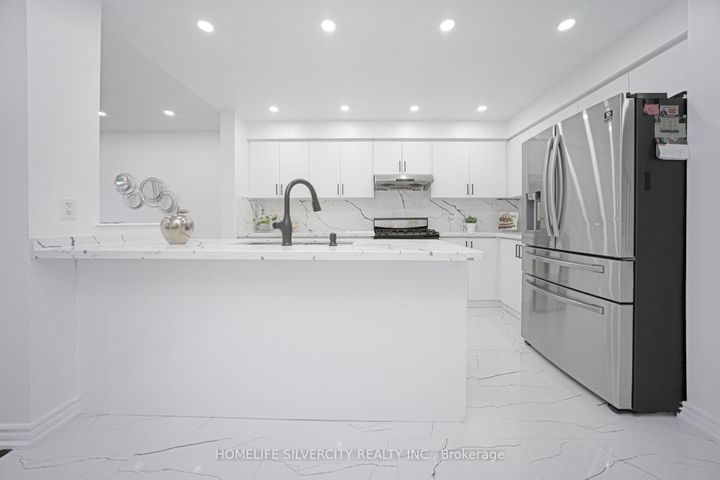 Photo 12 at 56 Cadillac Crescent S, Fletcher's Meadow, Brampton
