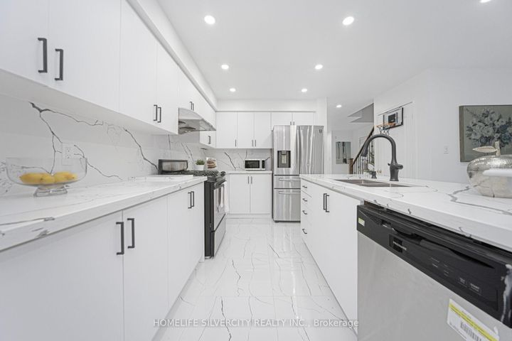 Photo 15 at 56 Cadillac Crescent S, Fletcher's Meadow, Brampton