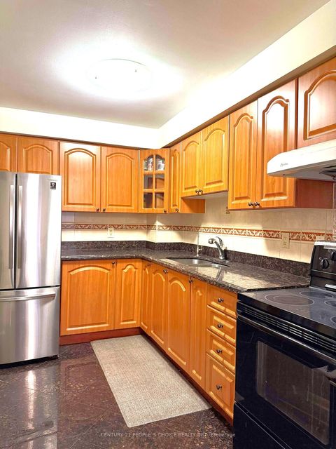 Photo 3 at 1 - 101 Dundalk Drive, Dorset Park, Toronto
