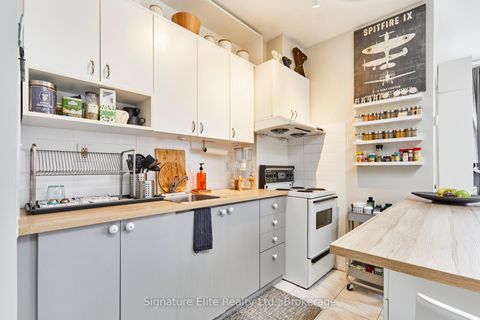 Photo 7 at 1395 Gerrard Street E, Coxwell, Toronto