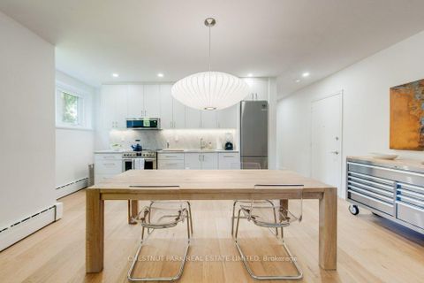 Photo 4 at 3 - 75 Scarborough Road, The Beaches, Toronto