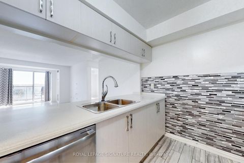 Photo 5 at 621 - 8 Mondeo Drive, Dorset Park, Toronto