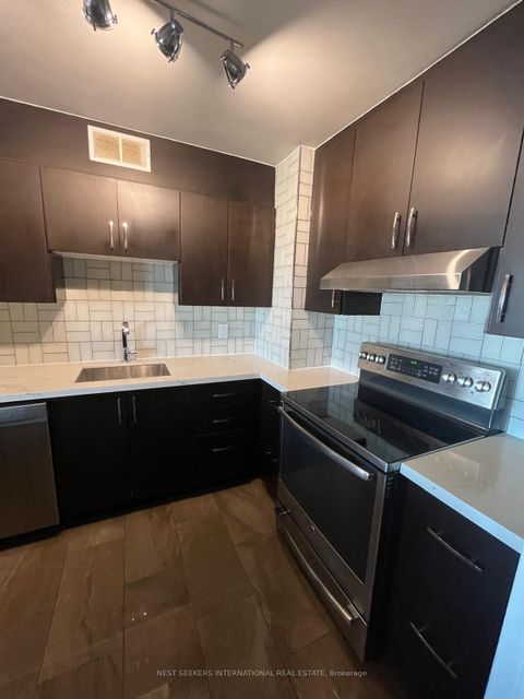 Photo 4 at 1004 - 9 Four Winds Drive, York University Heights, Toronto