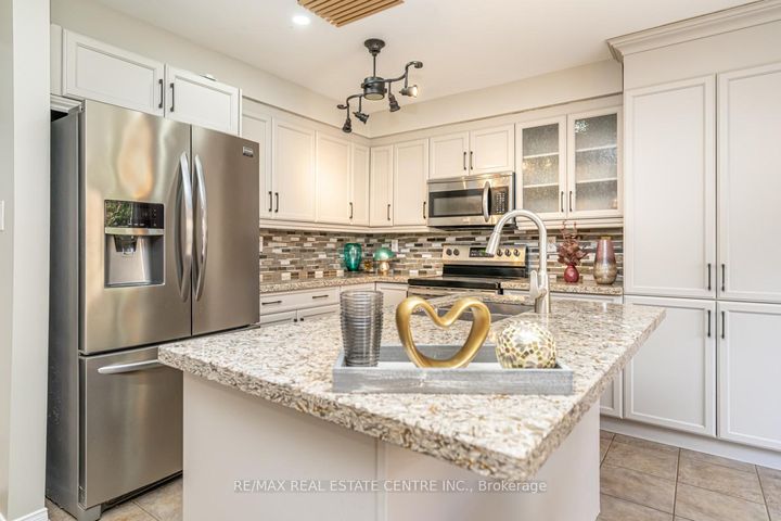 Photo 12 at 107 Crown Victoria Drive, Fletcher's Meadow, Brampton