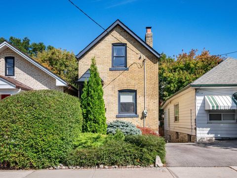 Photo 1 at 25 Newman Avenue, Crescent Town, Toronto
