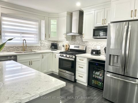 Photo 11 at 808 Sanok Drive, West Shore, Pickering